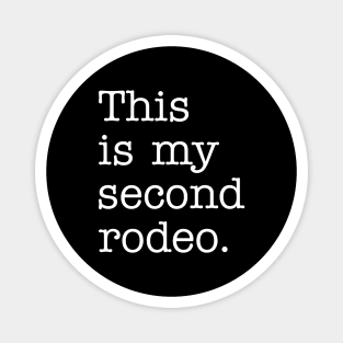 "This is my second rodeo." in plain white letters - cos you're not the noob, but barely Magnet